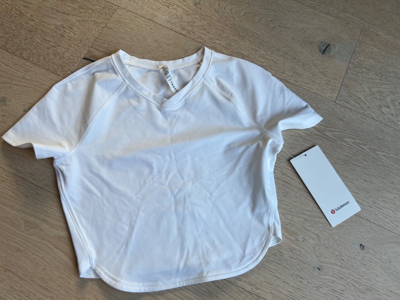 NWT Lululemon Nulux Cropped Tennis Short Sleeve Size 6 White