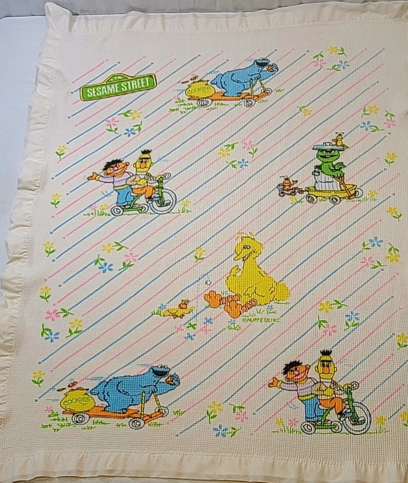 Manta de bebé tejida gofre térmica personaje calle sésamo de colección blanca ribete satinado Foto 2 de 4