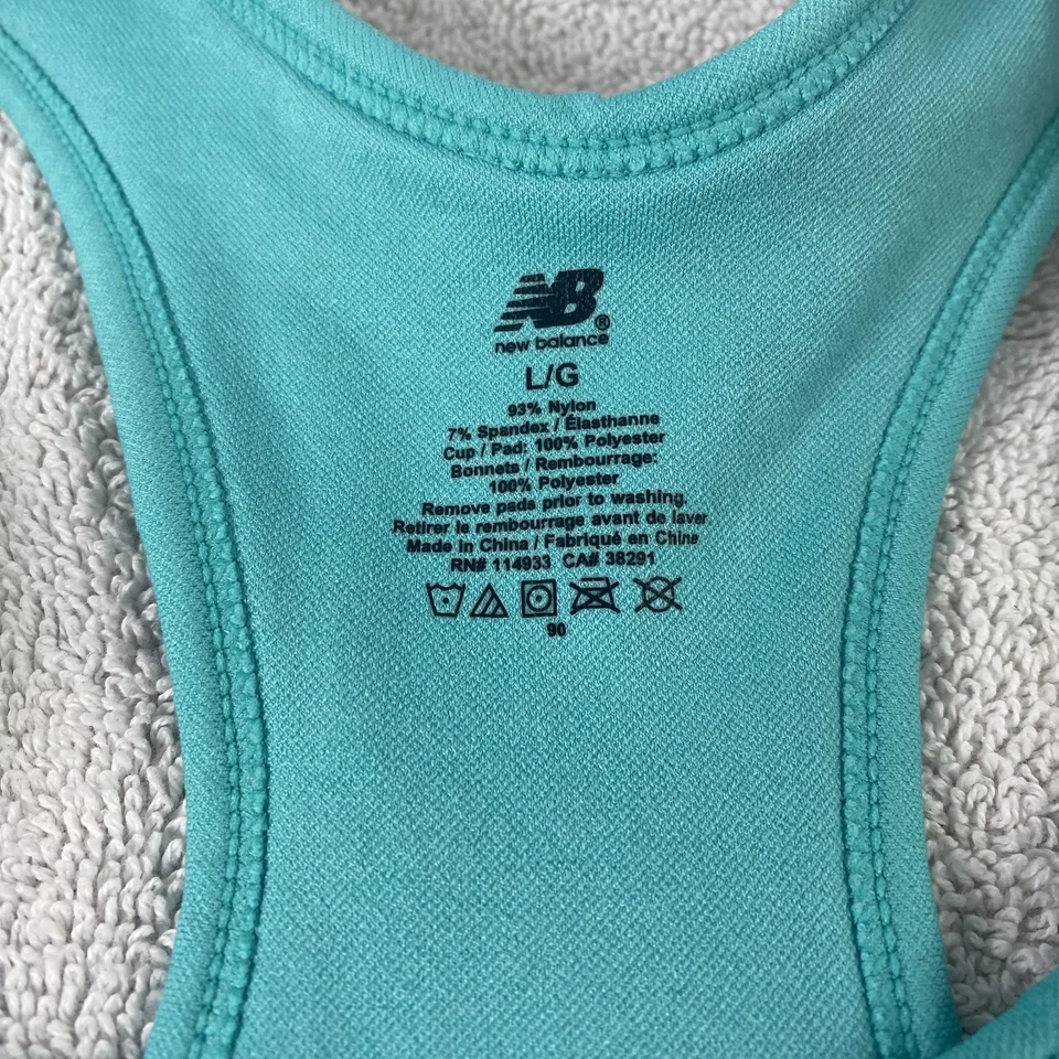 Sujetador deportivo New Balance para mujer grande verde azulado acanalado espalda deportiva logotipo elástico atlético Foto 3 de 4