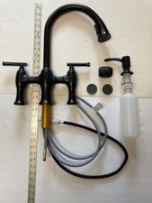 KOHLER kitchen faucet with pull down sprayer.