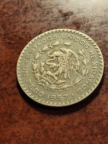 1957 Mexico Un Peso Silver — photo from the most recent tracked eBay sale