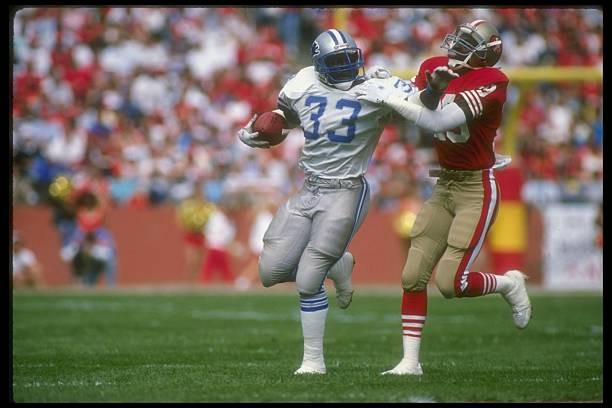 Running back Garry James Detroit Lions moves the ball as San Franc- Old Photo