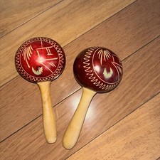 Pair Of Maracas carved and painted red wood
