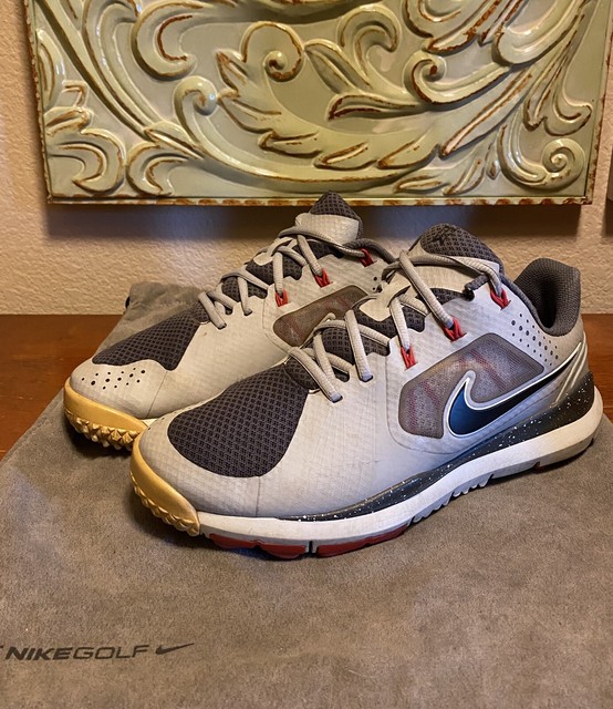 tiger woods golf shoes black and gold