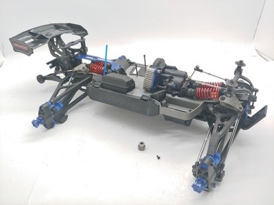 *RARE* TRAXXAS E-REVO BRUSHLESS EDITION 1.0 1/8 MONSTER TRUCK ROLLER SLIDER CHAS