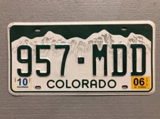 COLORADO ROCKY MOUNTAINS WHITE LICENSE PLATE RANDOM LETTERS/NUMBERS