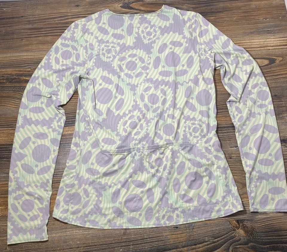 Top de ciclismo de manga larga con suela para bicicletas de rizo para mujer L cuello redondo UPF 50+ engranajes Foto 4 de 4