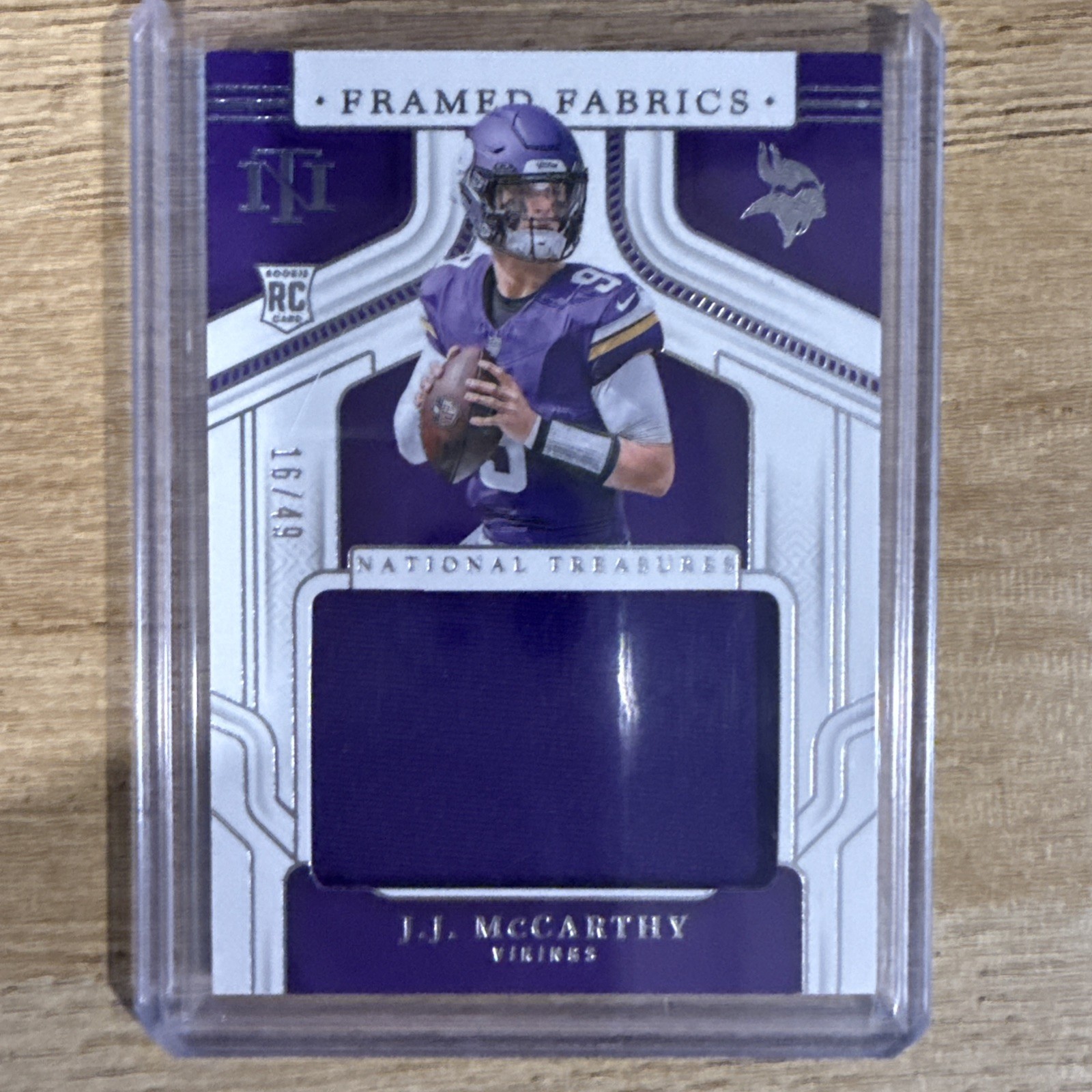 2024 National Treasures JJ McCarthy Framed Fabrics Rookie Patch 16/49 RC