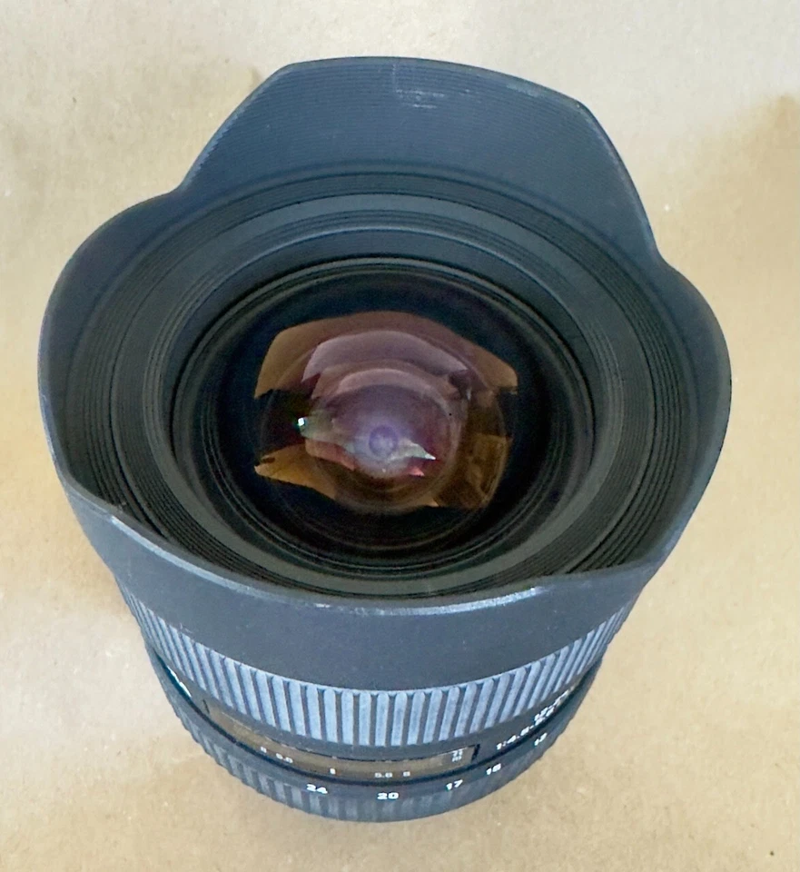 Lente zoom ultra ancho Sigma 12-24 mm f/4,5-5,6 DG HSM, para Canon "Excelente" Foto 2 de 4