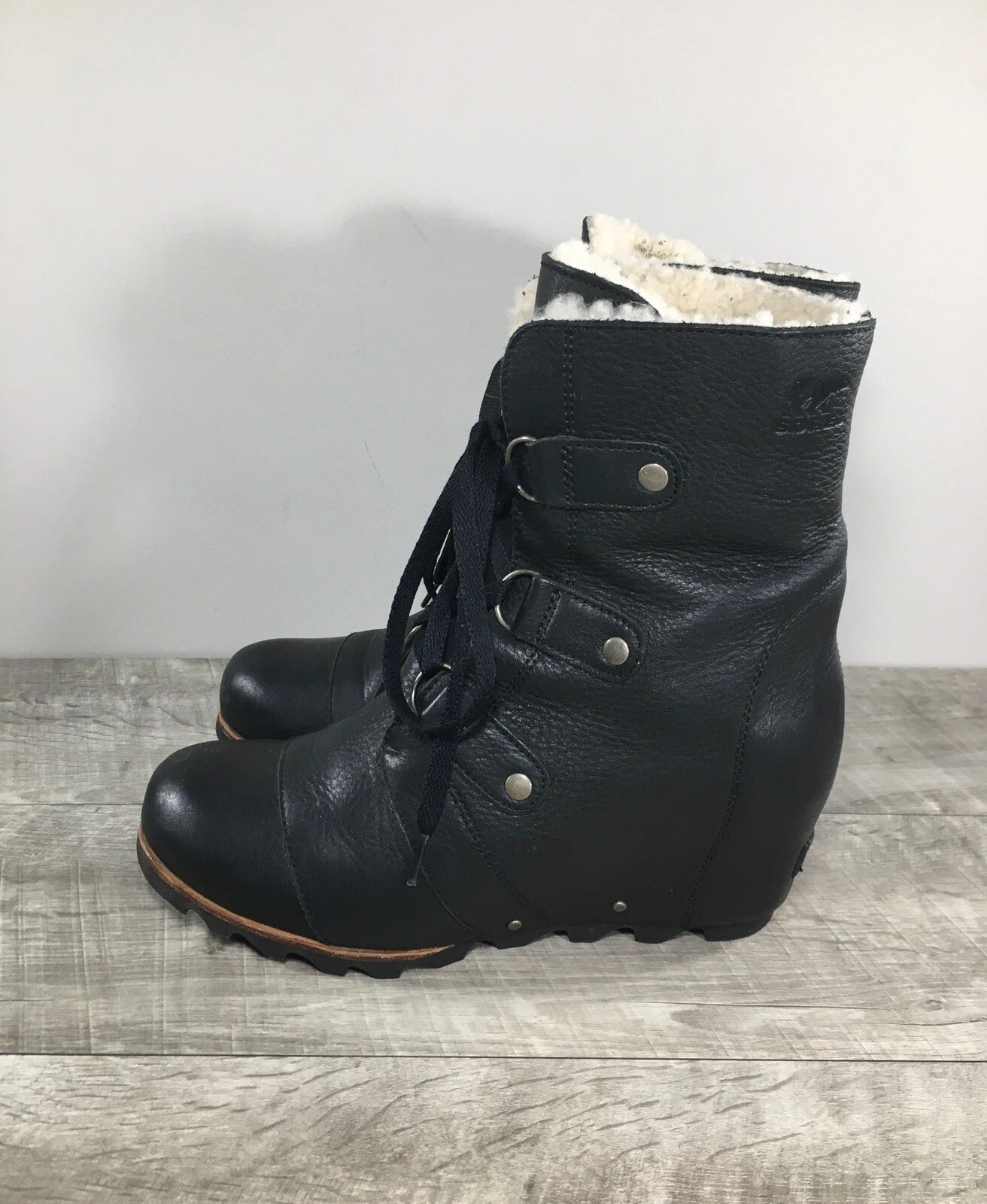 sorel joan of arctic wedge mid shearling lace up boots