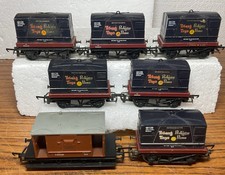 Rake Of 7 Tri-Ang Toys Pedigree Prams Conflat Wagons Containers & R.16 Brake Van