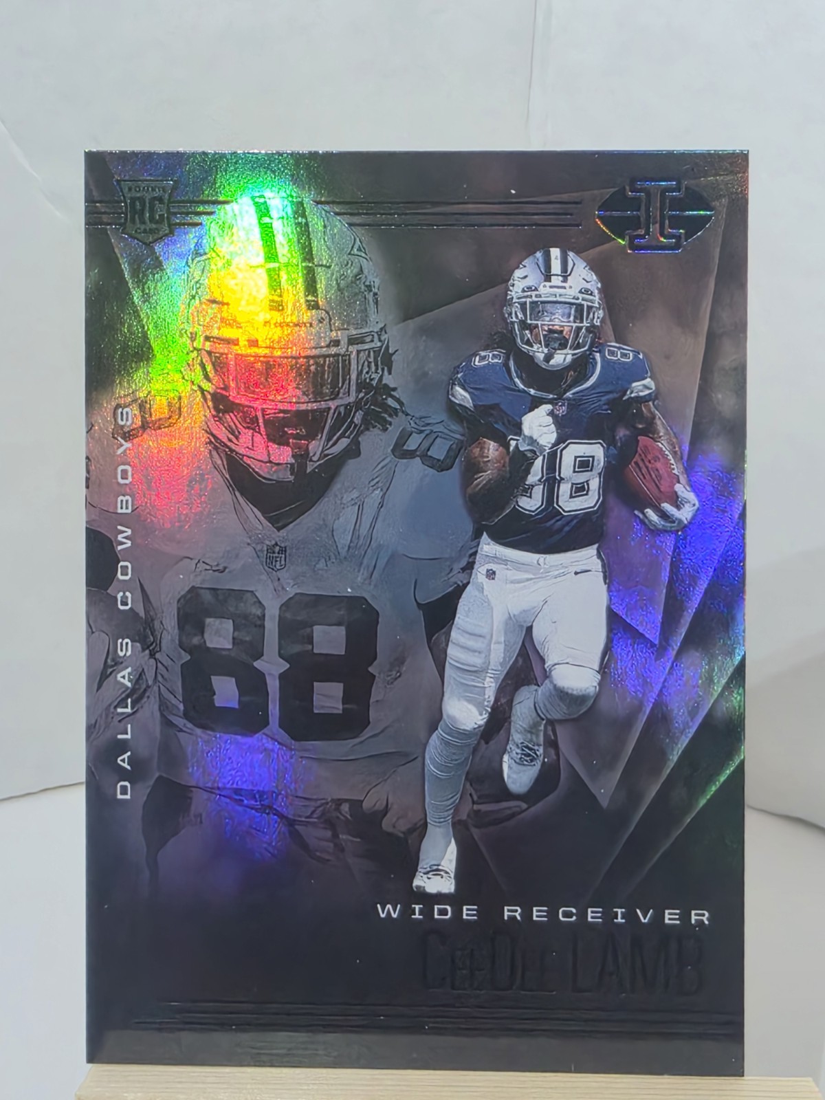 2020 Panini Illusions Trophy Collection Sapphire rookie card of CeeDee Lamb...