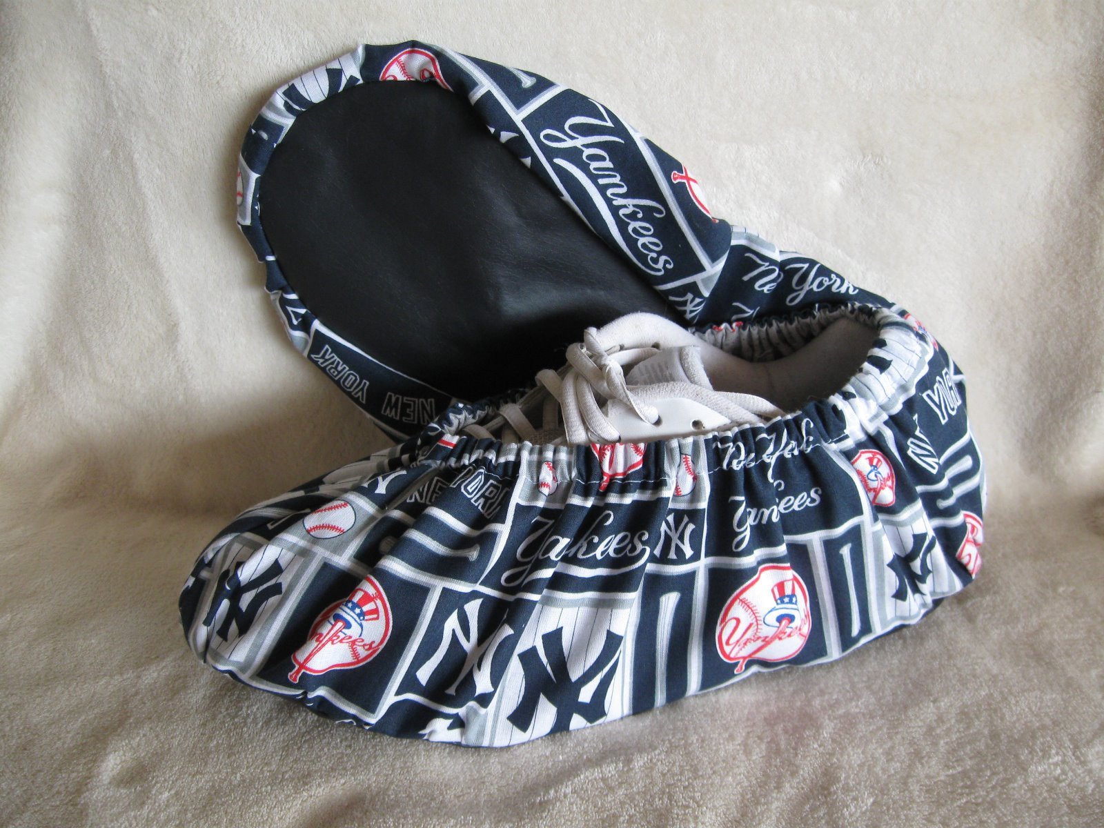 New York Yankees bowling shoe covers. Cotton, lined, vinyl soles. Men's