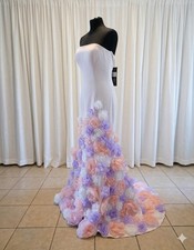 Terani Couture Strapless Mermaid Gown With Skirt Covered In Pastel Flowers.