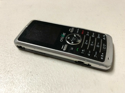 Cal-Comp A100 - Silver (Cricket) Cellular Phone - AS IS