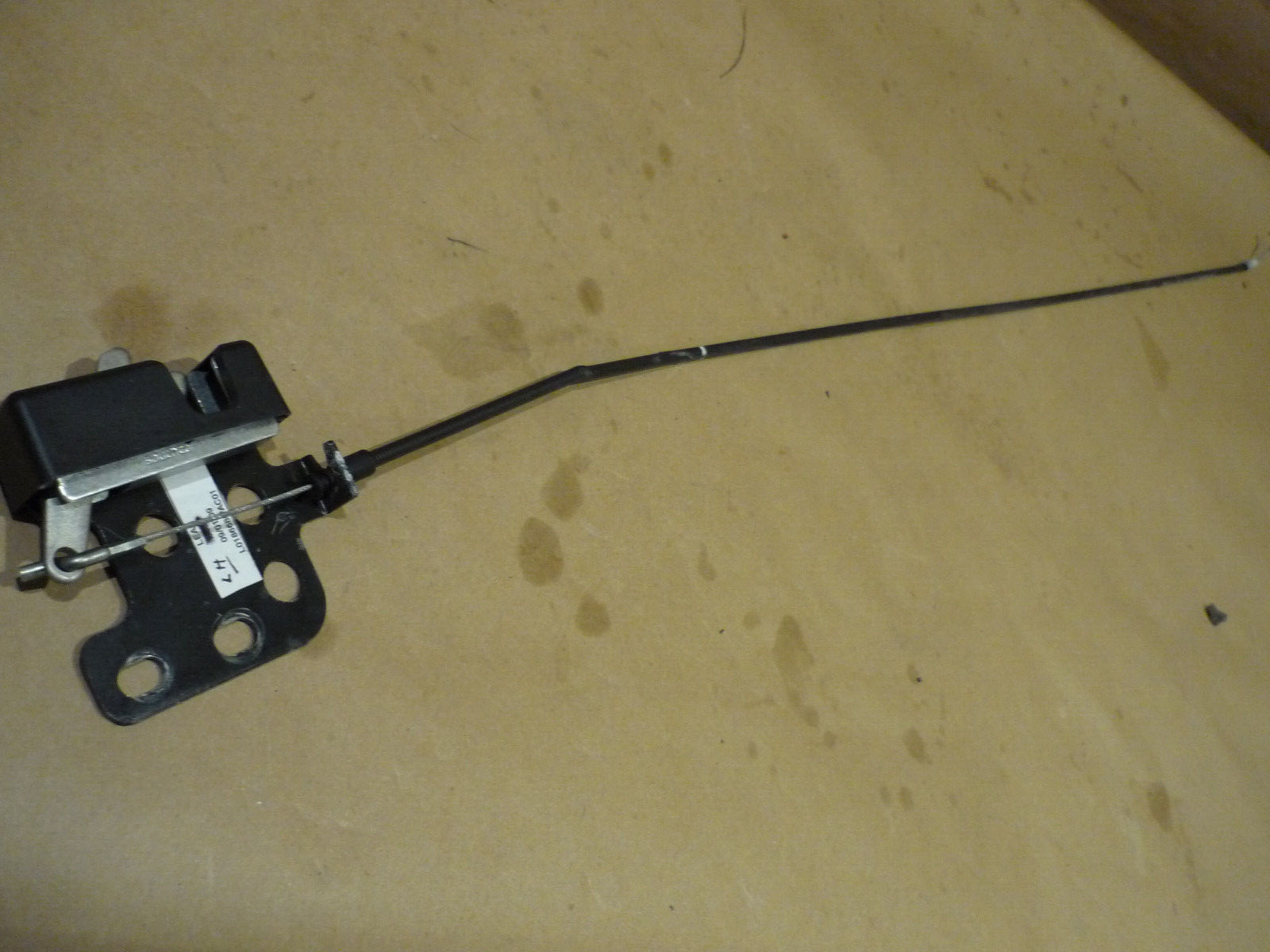 Ferrari California - LH Rear Seat Back Latch With Cable- P/N 82093500