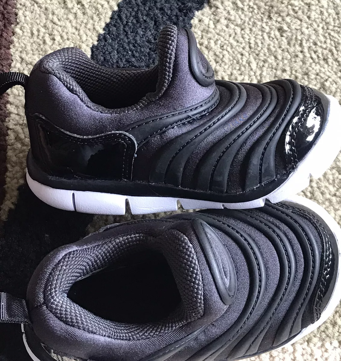Nike dynamo free junior sale