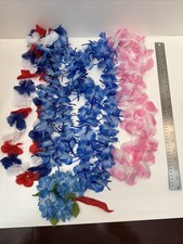 4 Hawaiian Flower Leis  1 Hawaiian Flower Stretch Bracelets