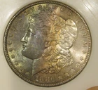 1886 Morgan Silver Dollar - UNC, Rainbow crescent shading Obv, Toned rev, 5100
