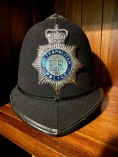 Vintage Metropolitan Police custodian helmet circa 2000.