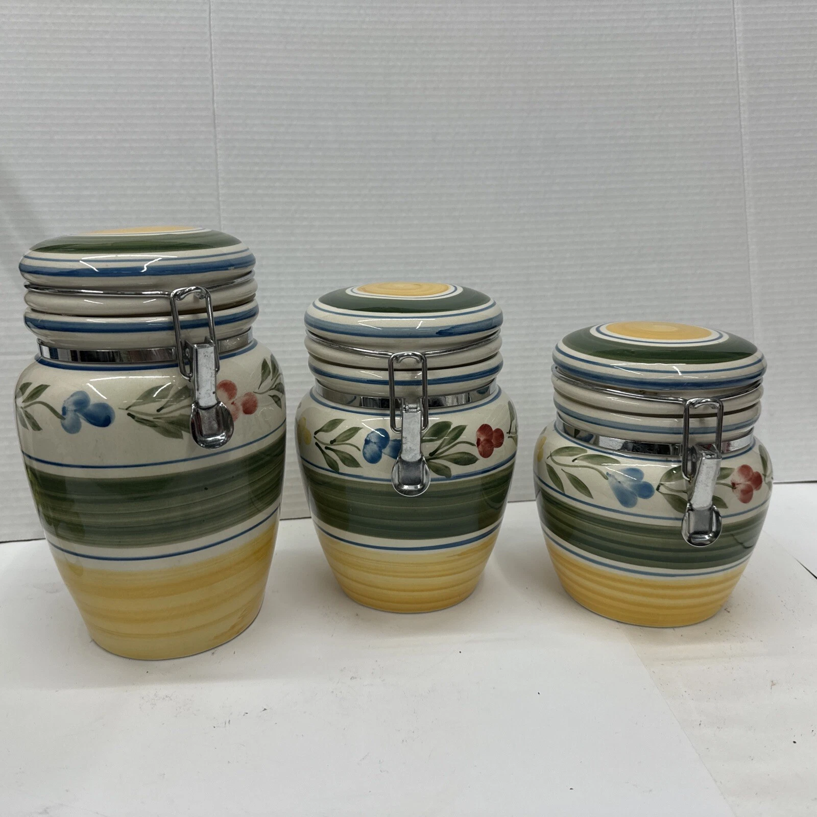 Gibson 3 piece Floral Canister set withBail Sealed Lid Blue Trim Green Gold