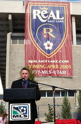 Real Salt Lake head coach John Ellinger stands at the podium benea- Old Photo