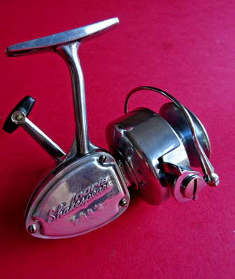 A NICE 1960/70'S RETRO NORIS SHAKESPEARE 2112 SPINNING REEL IN POLISHED FINISH