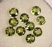PERIDOT. 4 mm Rd stones. Clean and very nicely faceted. 10 avail.