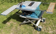 £754 RRP Makita MLT100 table saw cart 240V