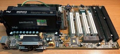 Soyo v6be+ motherboard  + pentium ii 266mhz + 65mb ram