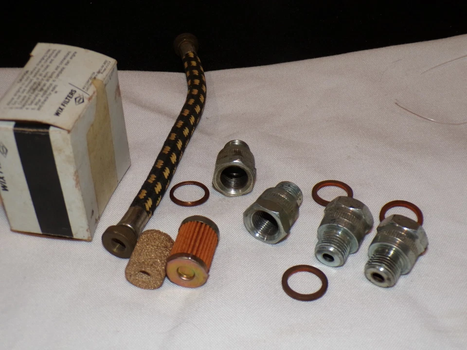 FILTRO DE COMBUSTIBLE BUICK CHEVY GMC OLDS & PONTIAC WIX 33044 y piezas diversas Foto 2 de 3