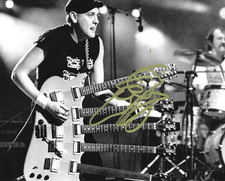 * RICK NIELSEN * signed 8x10 photo * CHEAP TRICK * COA *