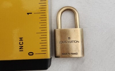 Louis Vuitton Lock And Key Set, Stamped, Numbered,Authentic #301