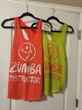 Zumba instructor Combo: 2 Pre-owned Tops & a New Bracelet. M