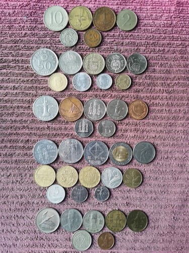 Coins from Angola, Spain, Arab Emirates, Italy, South Korea. Any Other