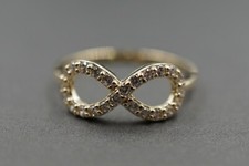 10K Solid Yellow Gold 7 mm x 16 mm Infinity CZ Band Ring. Size 7