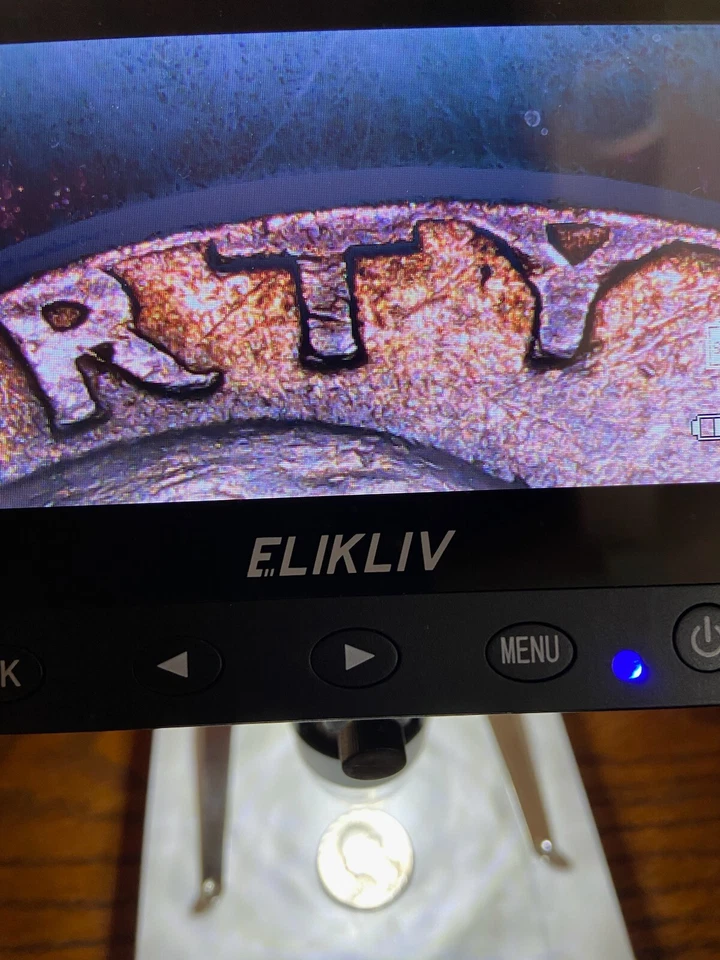 Moneda de error de cuarto D de cobre de Estados Unidos 1970 Liberty Letters on the Rim Foto 4 de 4