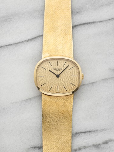 Vintage 1980s Patek Philippe Ellipse 3545 18k YG Champagne Dial Manual 32mm