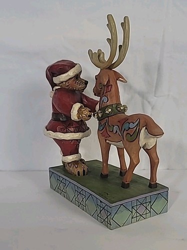 Jim Shore Kristopher Kringleclaus with Buckley Preparing for Takeoff #4022305 - Picture 7 of 16