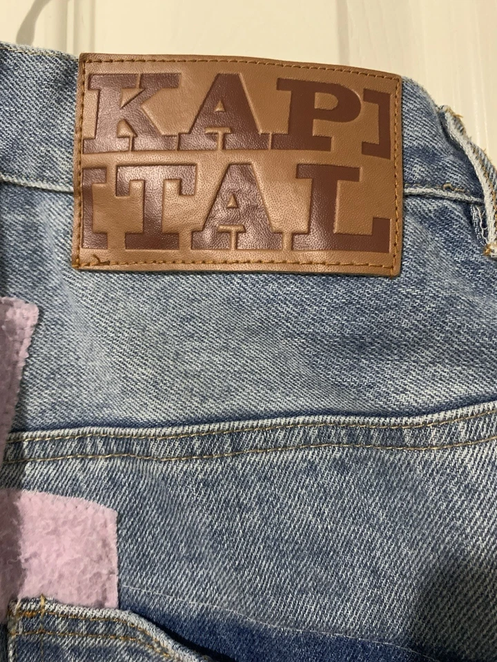 Pantalones de mezclilla vintage con parche facial sonriente Foto 3 de 4