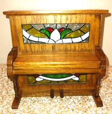 Glory Land Ent. Wood Piano w/stained glass-look inserts  Music plays Oh Susanna