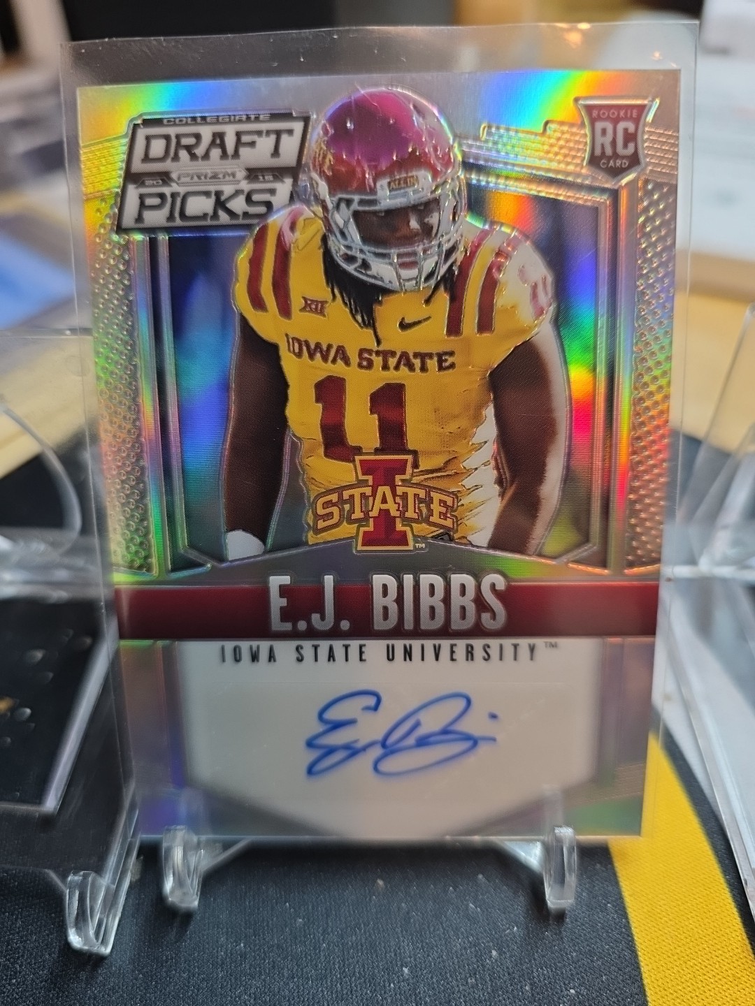 2015 PRIZM COLLEGIATE DRAFT E.J. BIBBS SILVER PRIZM RC AUTO #182 IOWA ST A26
