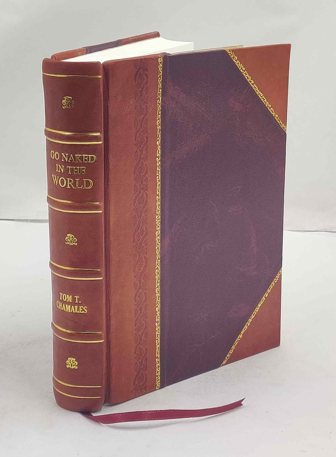 Go naked in the world; [novel] by Chamales, Tom T., [Leather Bound]