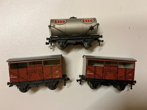 Hornby dublo, 3rail, unboxed two cattle wagons and a silver Esso tanker.