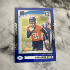 Panini 2024 Donruss Devaughn Vele Denver Broncos Blue Rated Rookie Prizm #395 