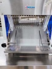 44246 OMCAN USED BREAD SLICER FREIGHT 385.00