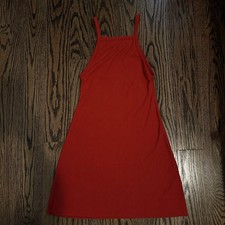 Worn once. Excellent condition. The color is a burnt orange or red ish. Size XS