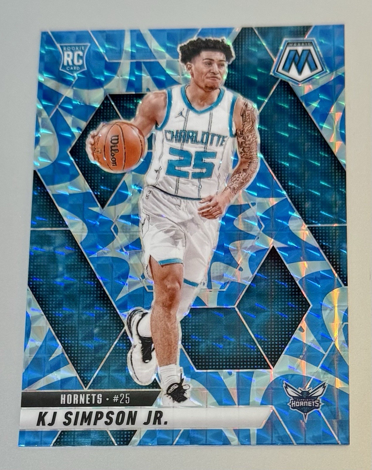 2024-25 Panini Mosaic KJ Simpson Jr. Reactive Blue Prizm (RC) #239 Rookie Card
