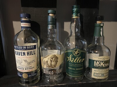 4 Empty bourbon bottles- Weller, Henry McKenna, Buffalo trace, Heaven hill