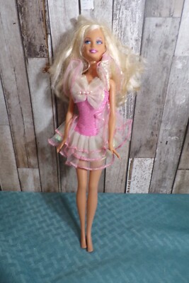 Barbie doll pink irridescent party dress and frilly dress side glance lipstick